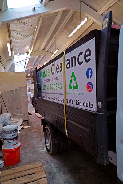 Side of Best Waste Clearance truck.